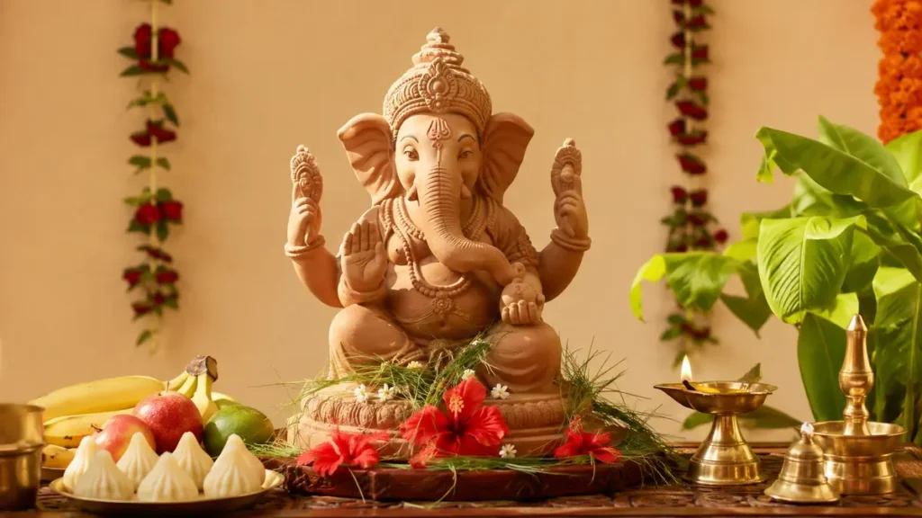 गणेश चतुर्थी स्थापना पूजा विधि के लिए सजी पूजा चौकी और प्रमुख सामग्री